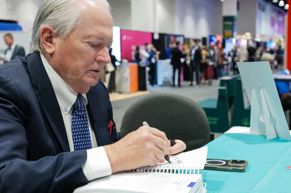 Dr. Stahl participating in the exhibit hall at NEI Spring Congress